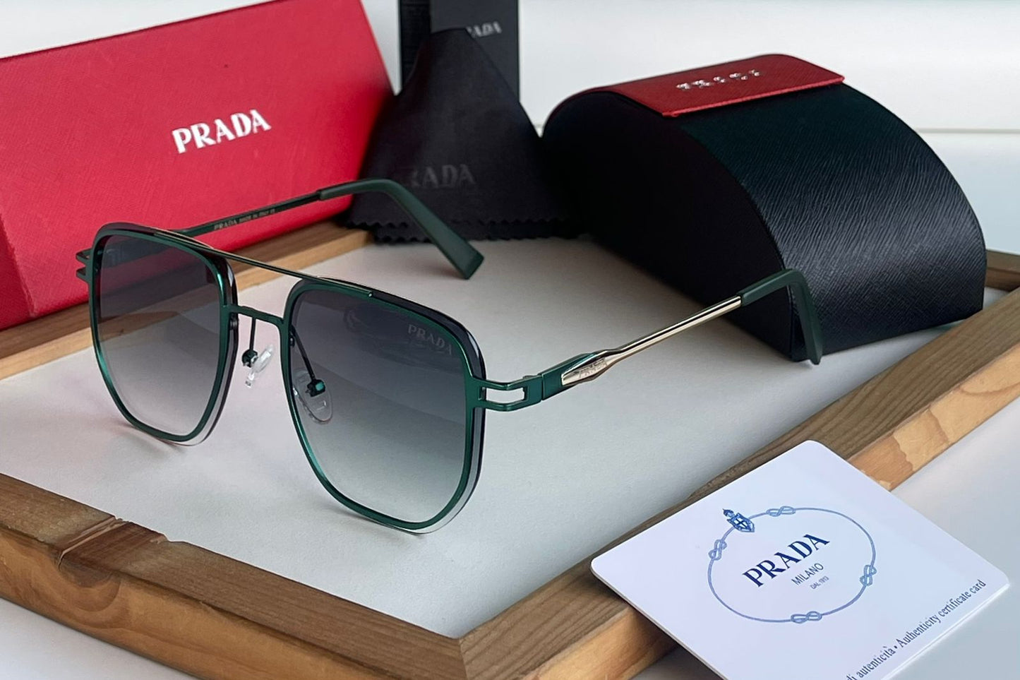 PRADA SUNGLASSES